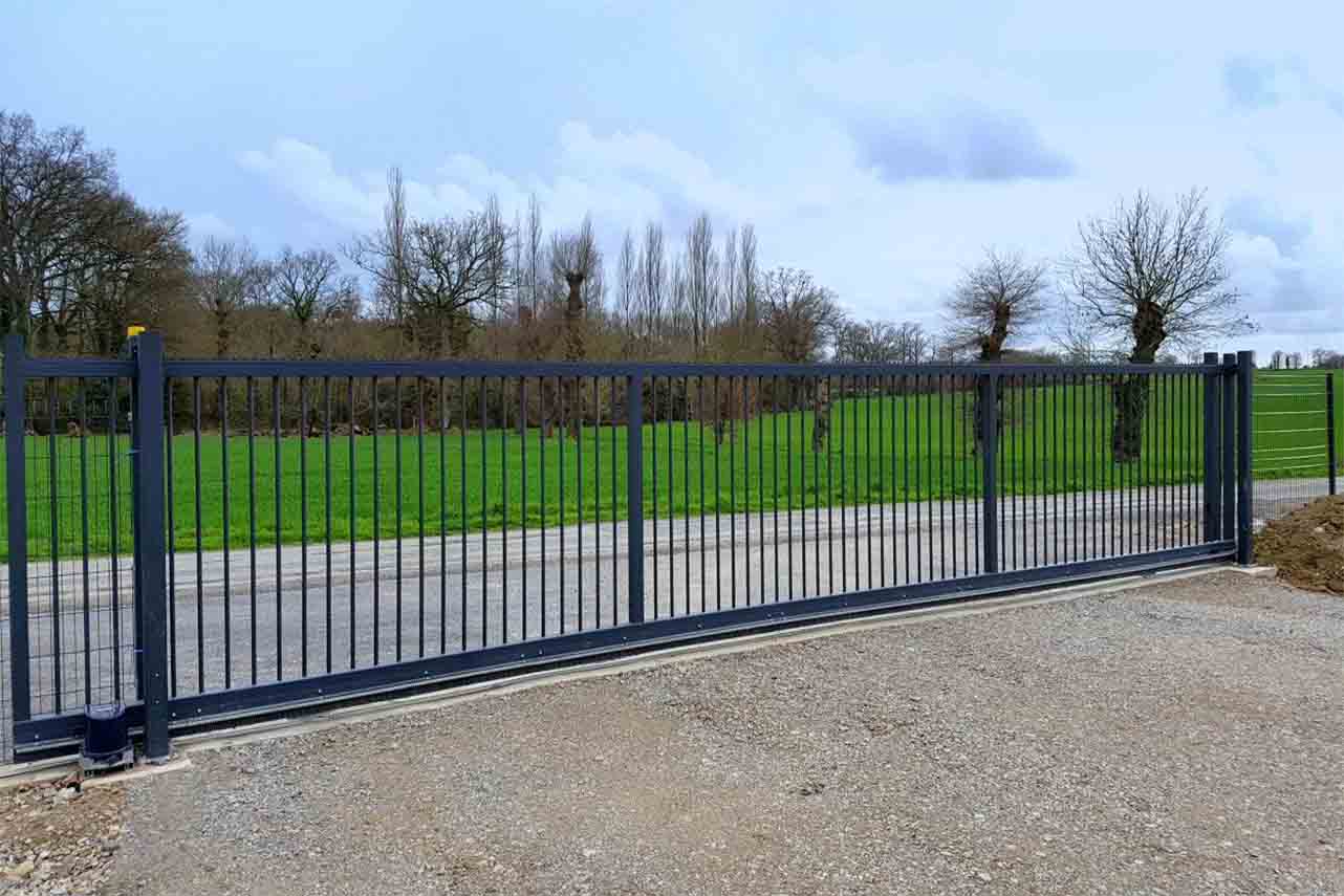 portail-coulissant-acier-industriel-barreaudage-rond-gris-anthracite-pv2